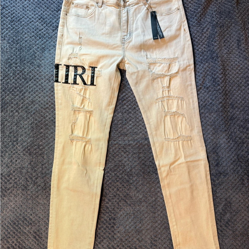 Amiri Light Wash Distressed Denim
Size 38